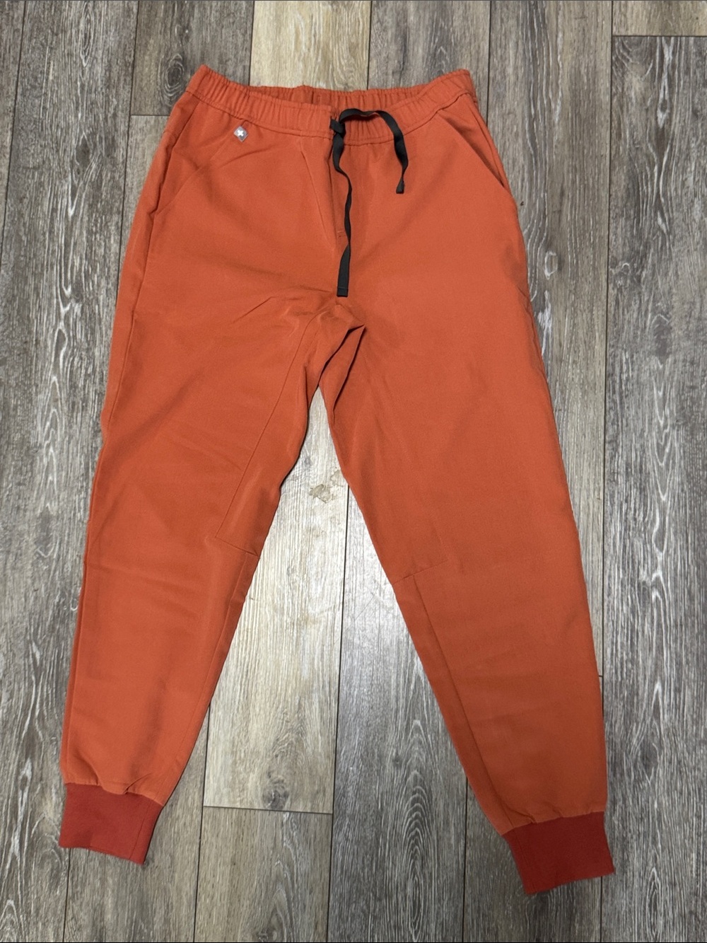 Figs Men's Burnt Orange Jogger style scrub pants with Black Drawstring